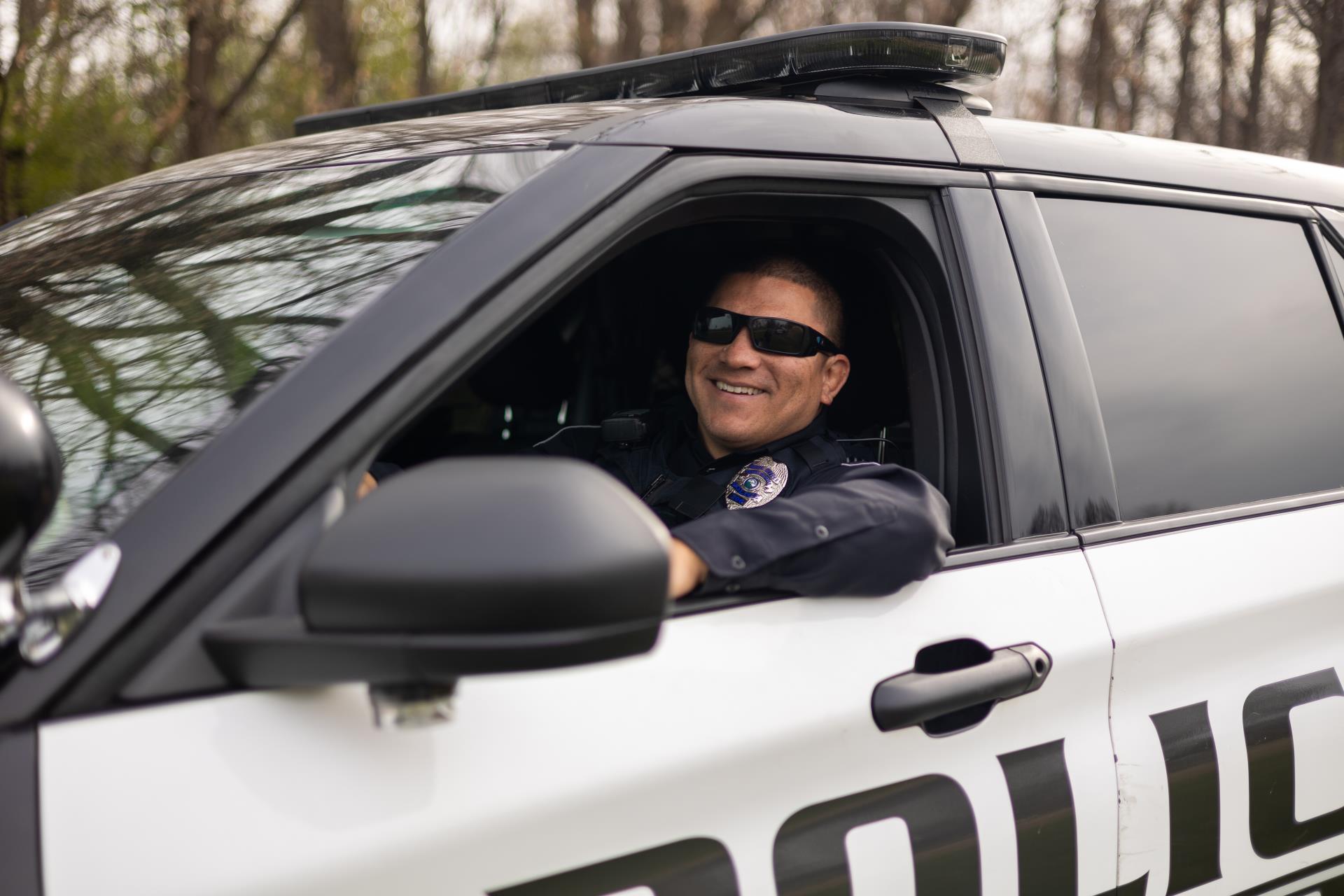 Martinez in Vehicle looking out